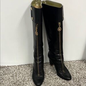 Chic Black Heeled Boots with Gold Details